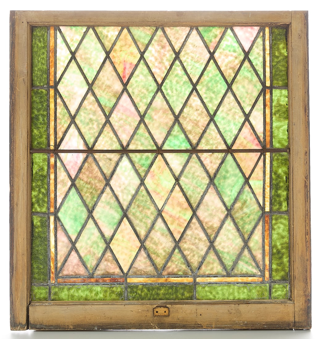 Arts & Crafts Stained Glass Diamond Window: Arts & Crafts slag stained glass window with a repeating diamond motif. In green and yellow glass with wooden frame.Height: 34 1/4 in x width: 32 in x depth: 2 in.