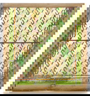 Arts & Crafts Stained Glass Diamond Window: Arts & Crafts slag stained glass window with a repeating diamond motif. In green and yellow glass with wooden frame.Height: 34 1/4 in x width: 32 in x depth: 2 in.