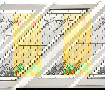 Pair Arts & Crafts Stained Glass Windows Floral: Pair of Arts & Crafts or Art Nouveau slag stained glass windows with green and pink floral motifs on a yellow background. Bordered by faceted clear glass. In white painted wood frames. Each frame with