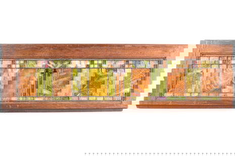 American Arts & Crafts Stained Glass Window: Arts & Crafts or Art Deco slag stained glass window with geometric motifs. With green, opal, and hints of purple slag glass. Wooden frame with two modern applied loop hanging implements.Height: 13 in