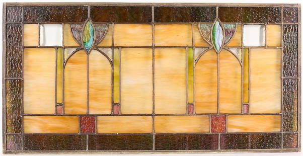 Arts & Crafts Stained Glass Window: Arts & Crafts or Art Nouveau slag stained glass window. With geometric designs in pink, green, ochre, and dark olive color. Two panels of faceted clear glass. Metal frame.Height: 16 1/4 in x width: 32