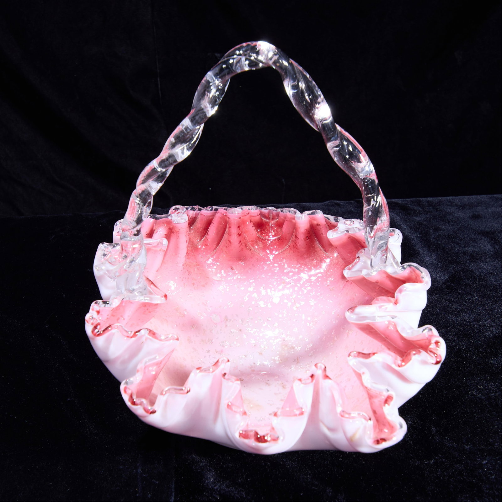Glass Wedding Ruffle Pink Basket: Cranberry glass with irridescent flakes and ruffle edge.Height: 11 in x width: 11 in x depth: 9 in.