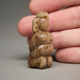 Chinese Carved Jade or Hardstone Kneeling Figure
