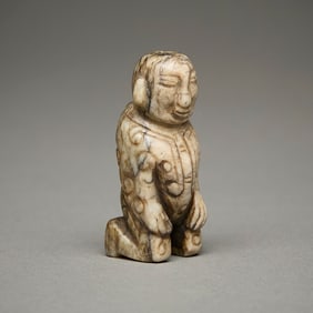 Chinese Carved Jade or Hardstone Kneeling Figure