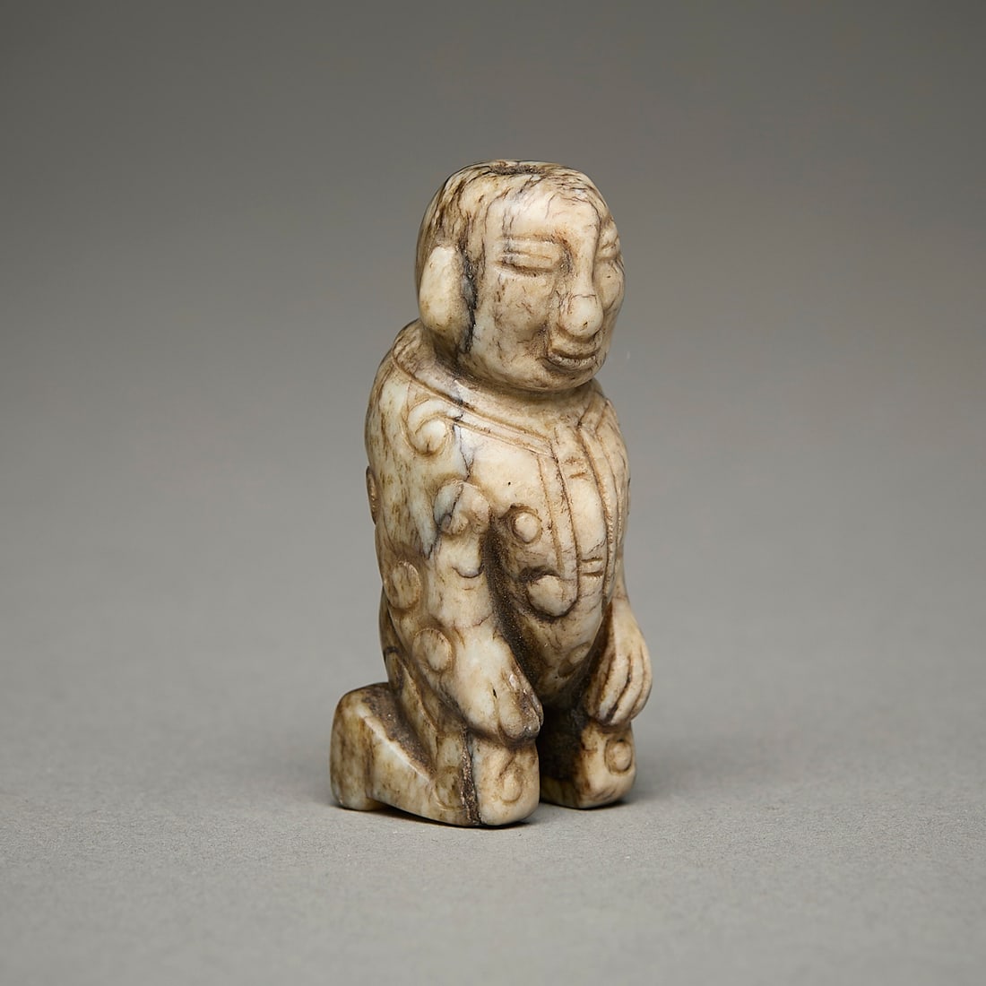Chinese Carved Jade or Hardstone Kneeling Figure (1 of 4)