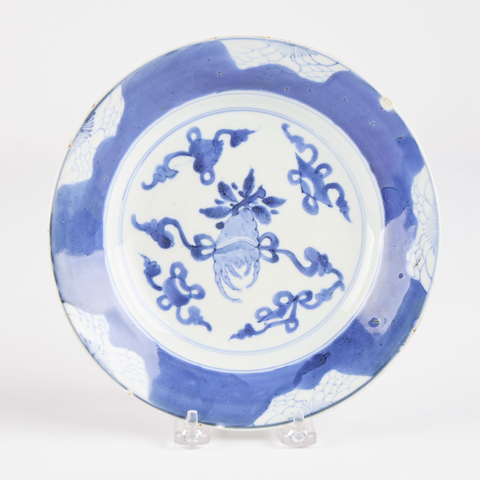 18th c. Chinese Blue & White Ceramic Plate: Chinese blue and white porcelain plate or dish, 18th century. With several labels and character marks along the underside.Diameter: 8 in.