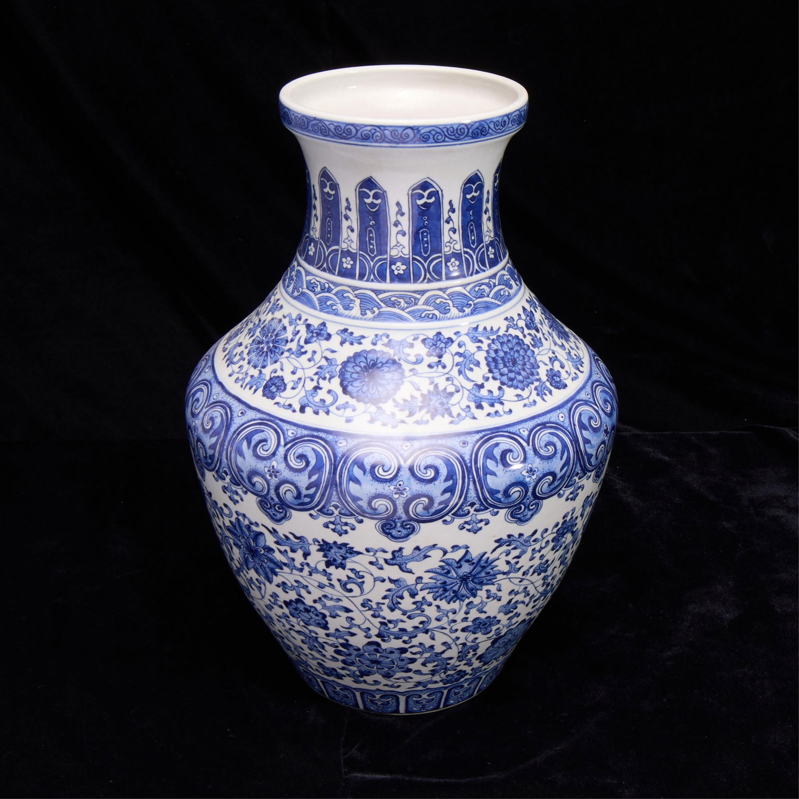 Lrg Chinese Blue & White Porcelain Baluster Vase: Large Chinese blue and white porcelain vase of baluster form. With profuse foliate motifs.Height: 15 in x diameter: 10 in.