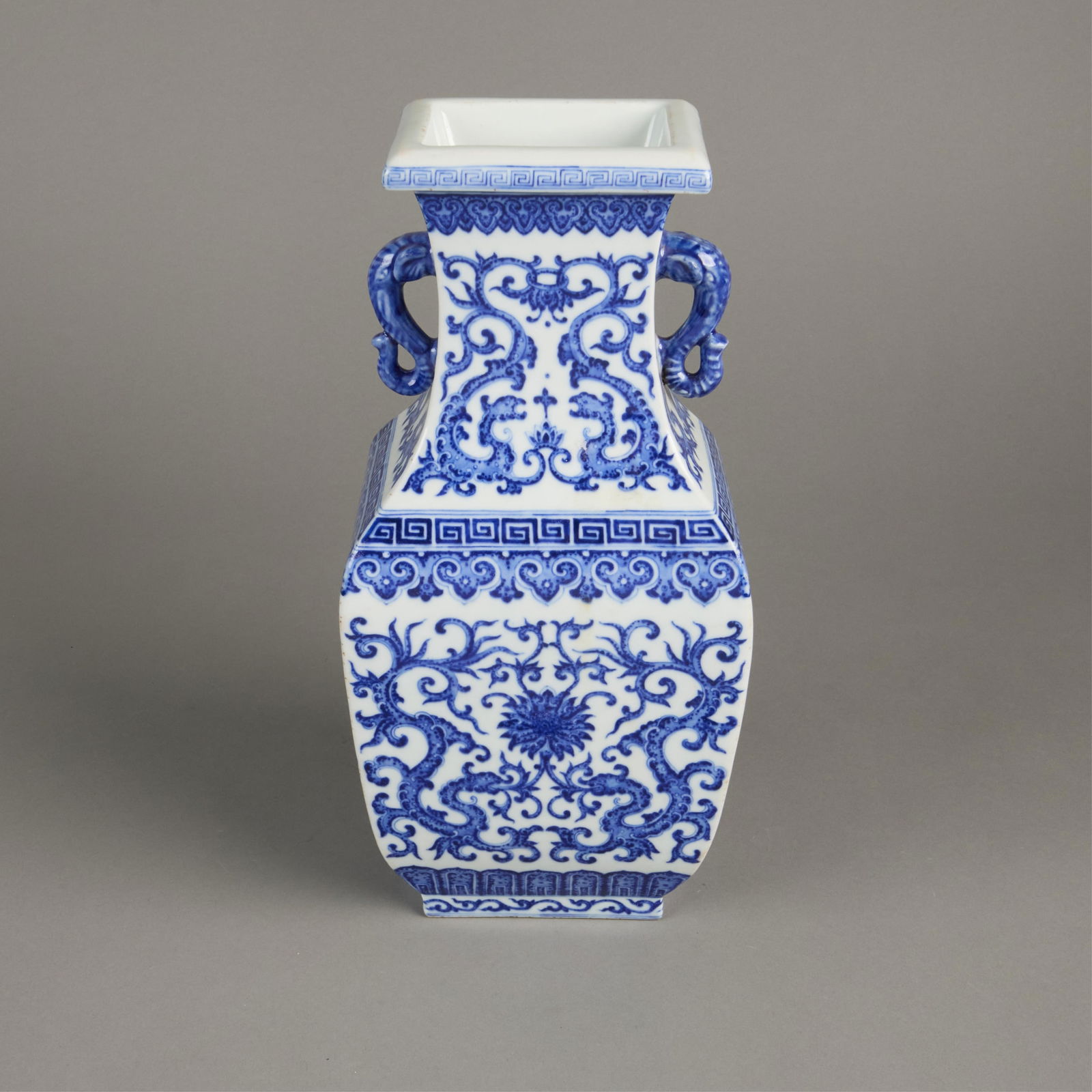 Large Chinese Blue & White Porcelain Vase: Large Chinese blue and white porcelain vase of square form.Height: 14 in x width: 7 in x depth: 5 in.