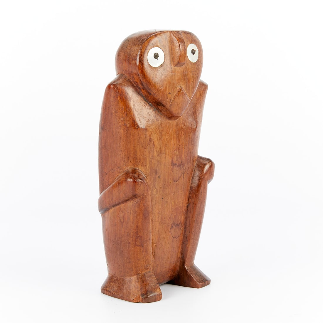 WWII Era Caroline Islands Seated Wooden Figure: Seated wooden figure from the Caroline Islands, Palau or Satawan, Micronesia, WWII-era. Height: 8 1/4 in x width: 3 1/2 in x depth: 2 1/2 in.