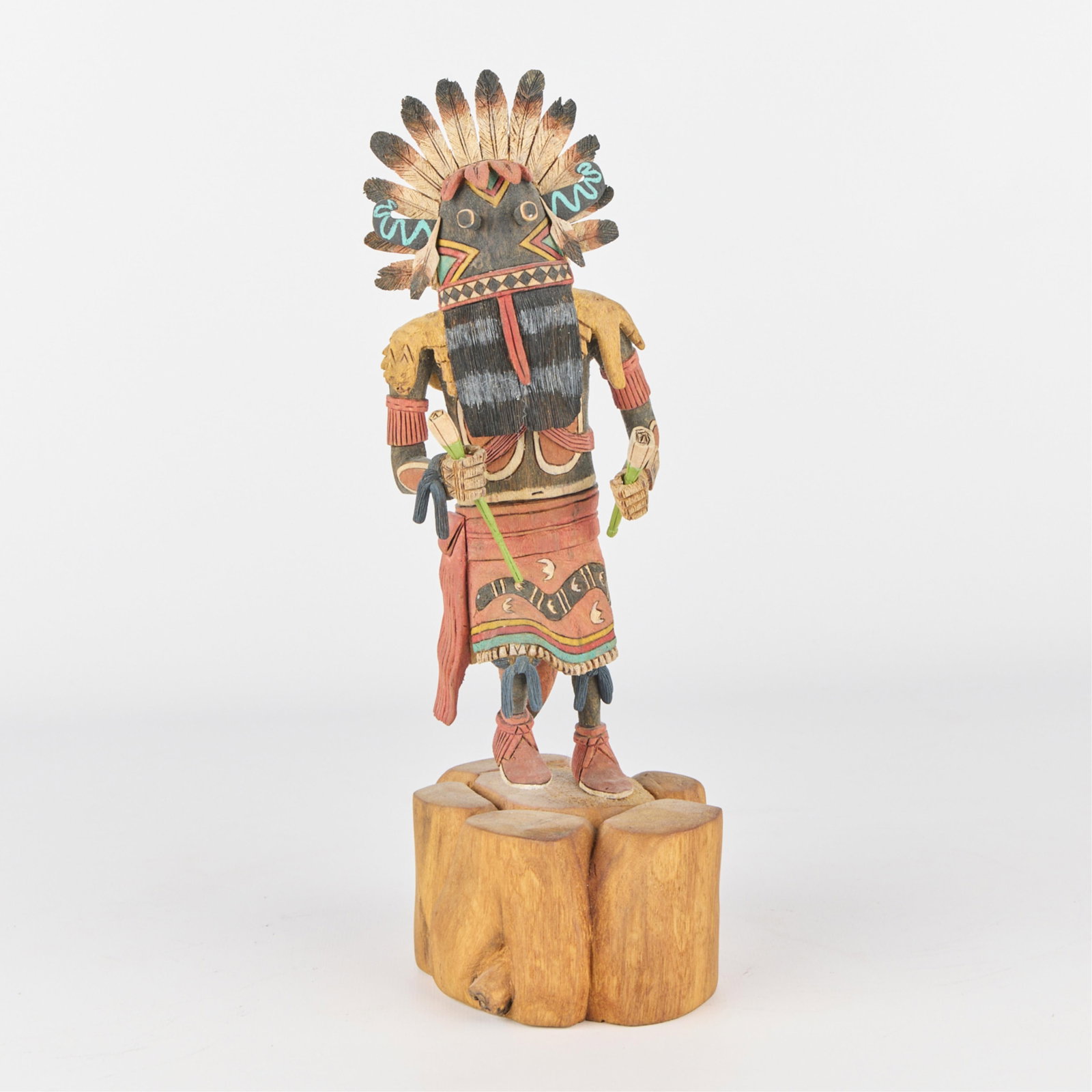 D. Masa Hopi Kachina Doll: Hopi carved wooden polychrome kachina doll. Incised signature and dated 1994 along the underside. With Allard Auctions tag. Height: 12 in x width: 4 in x depth: 5 in.