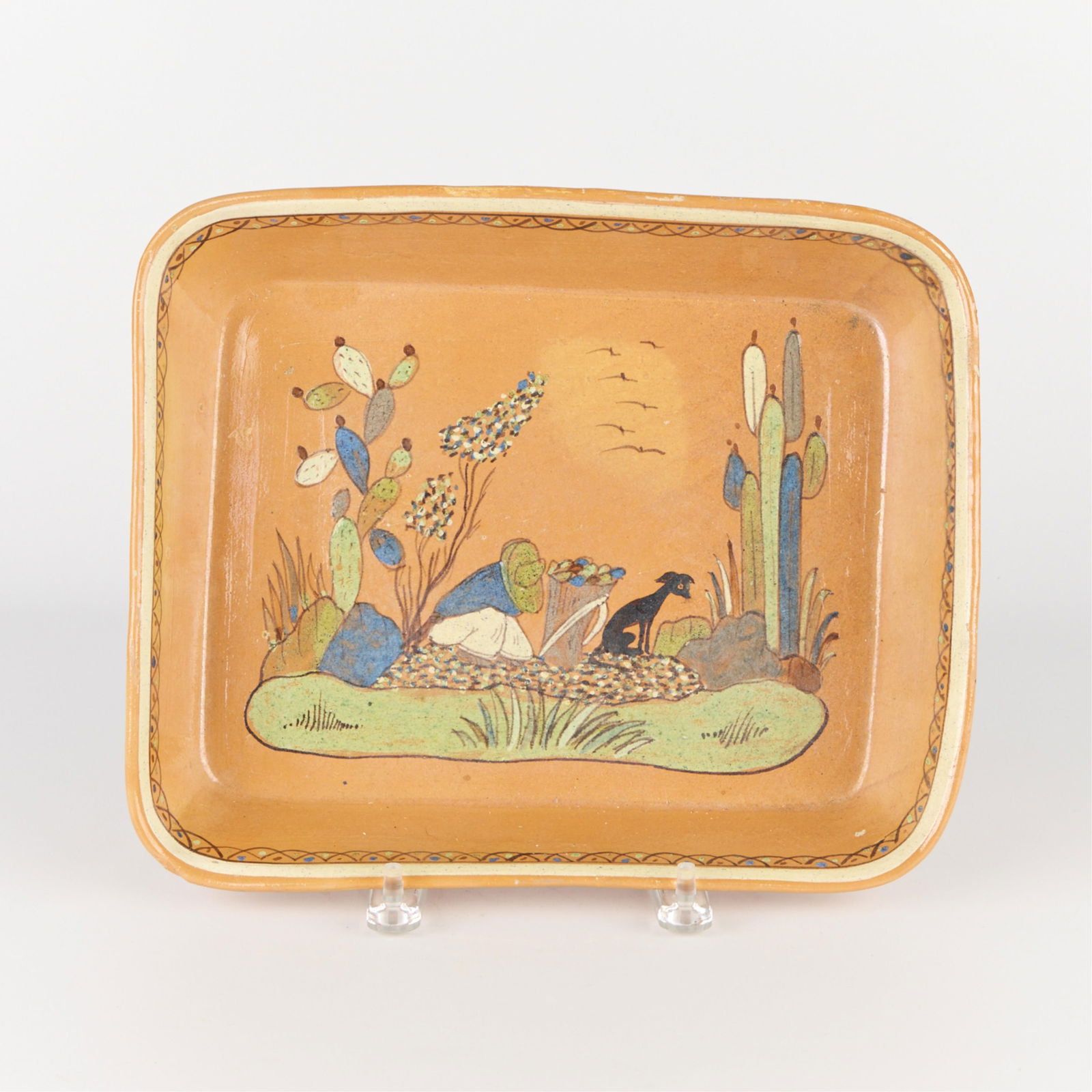 Mexican Folk Art Tlaquepaque Pottery Ceramic Tray: Vintage Mexican folk art "Tlaquepaque" tourist pottery trays depicting pastoral scenes of campesino figures, rabbits, cactus, and agave against an orange slip ground, ca. 1930s-1940s.Height: 2 in x wi