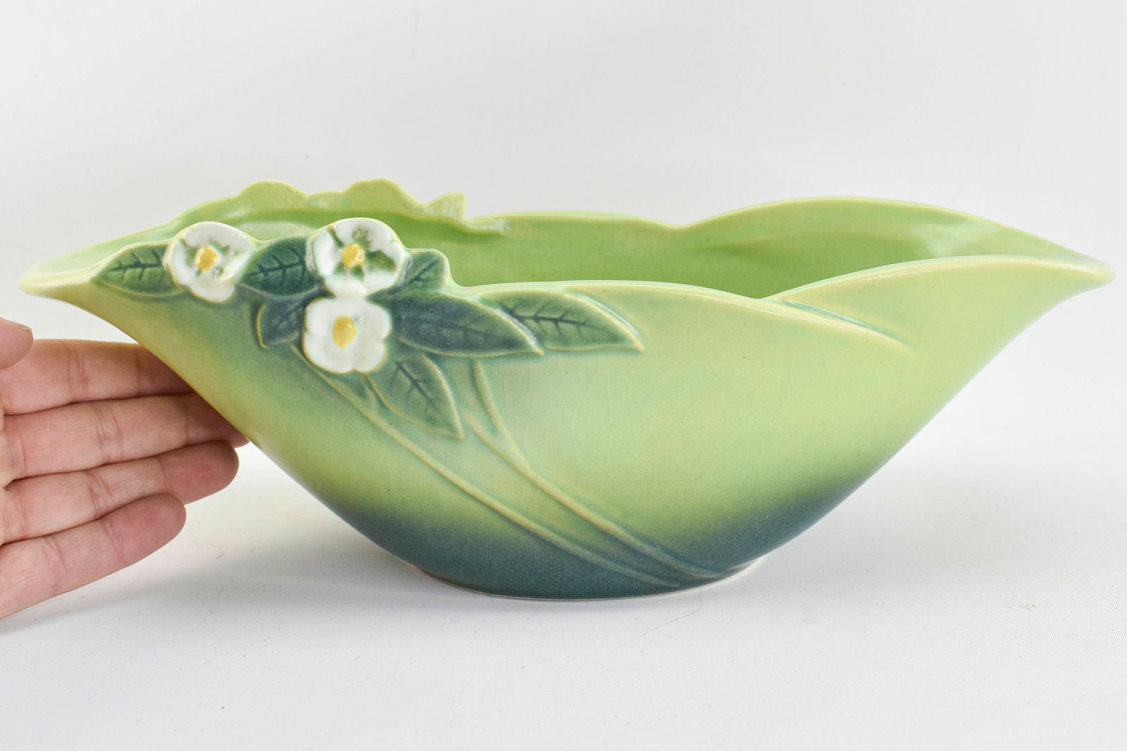 Roseville Pottery 934-12 Mock Orange Bowl: Roseville Pottery Mock Orange oblong bowl 934-12, light and dark greens.Height: 4 1/2 in x width: 13 1/4 in x depth: 5 1/2 in.