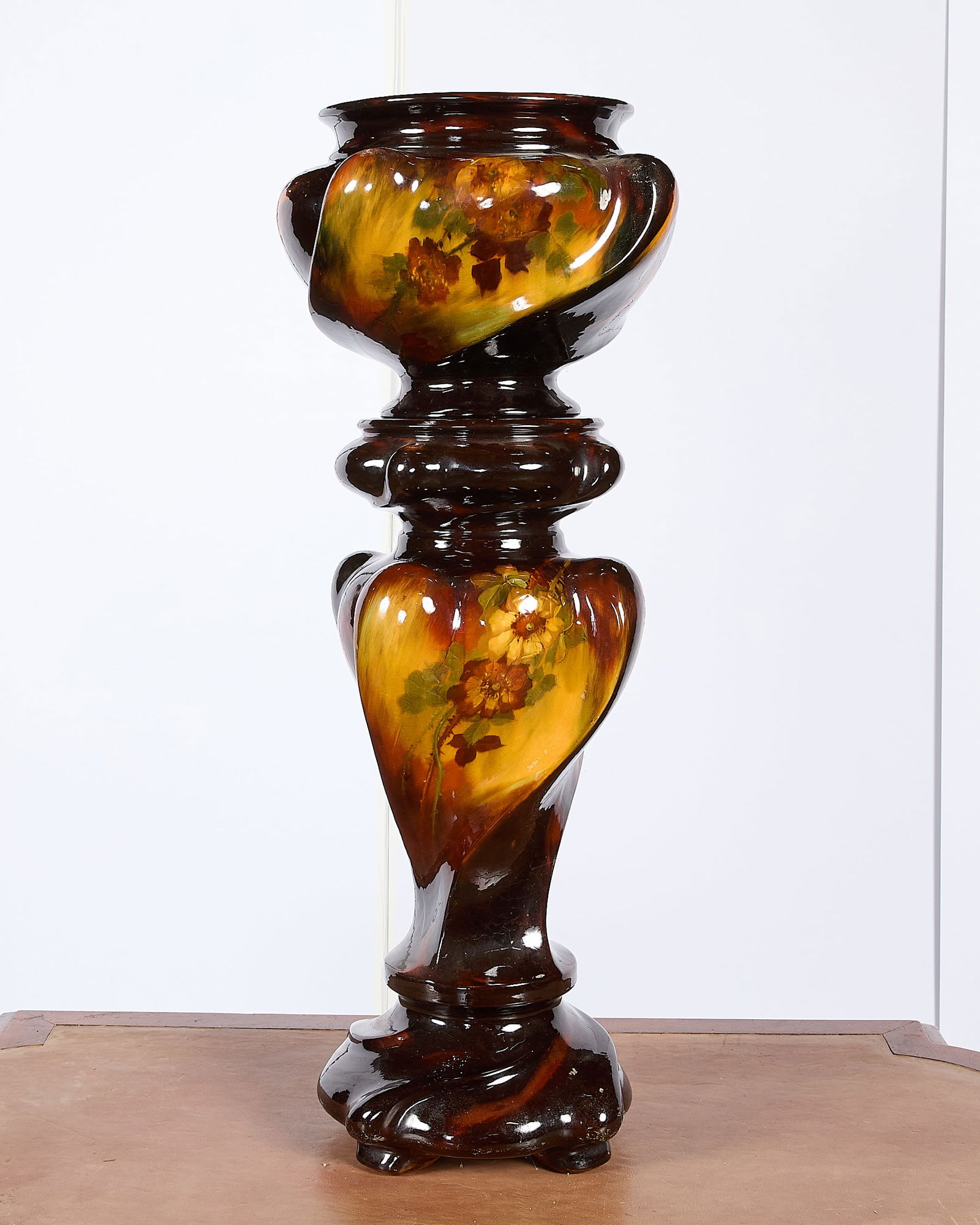 Antique Ceramic Weller Jardinere & Stand: Antique ceramic Weller jardinere and large stand or vase. Each adorned with painted detailing.(Stand) Height: 28 in x diameter: 11 in. (Jardinere) Height: 12 in x diameter: 16 in.