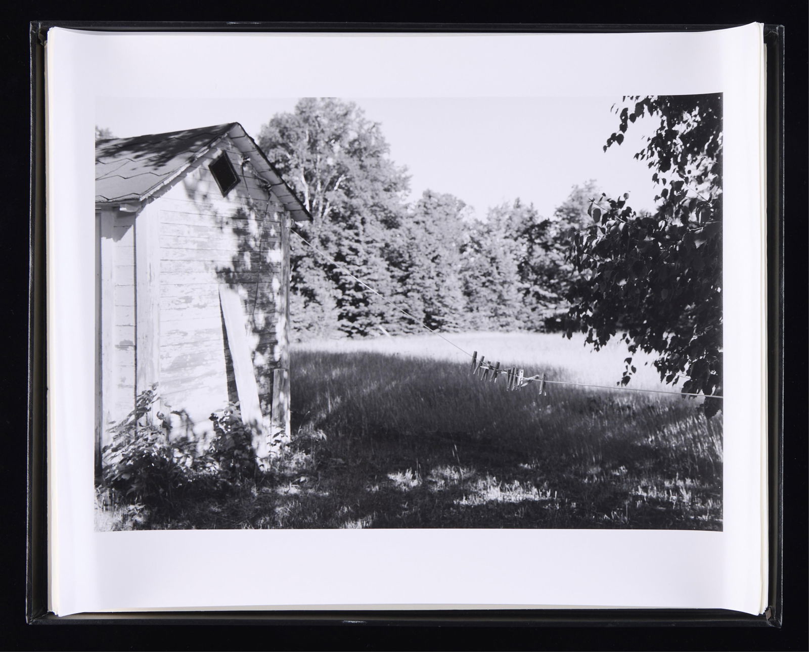 14 Pc Andy Baugnet Photographic Portfolio: Andy Baugnet portfolio containing 14 black and white landscape photographs. Each variously pencil signed and dated along the lower edge of the verso. (Photos, each) height: 16 in x width: 20 in.