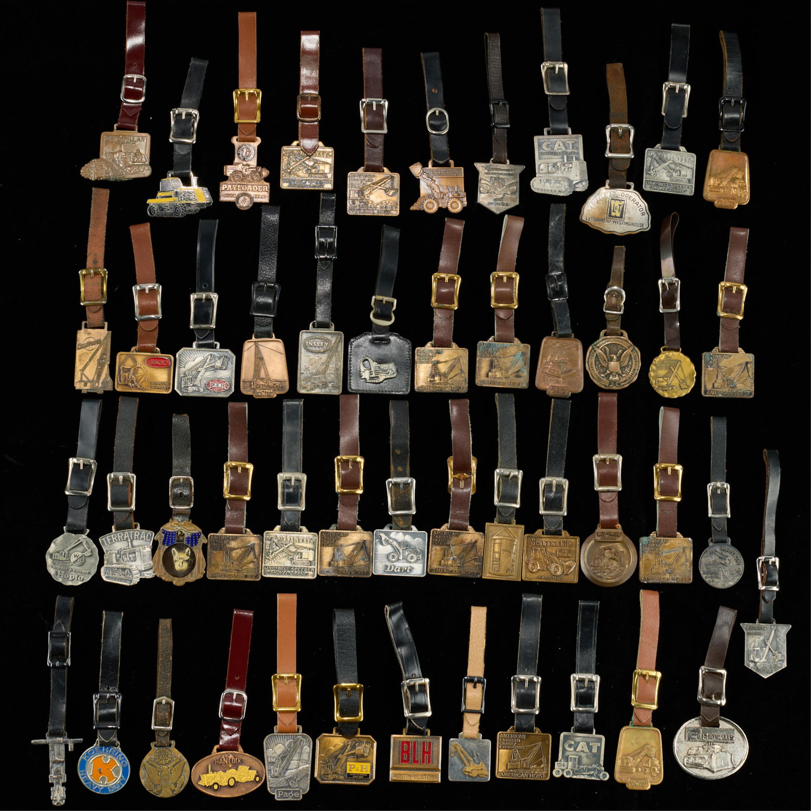 Group Assorted Vintage Watch Fobs: Large group of assorted vintage watch fobs. (Shipping dimensions) Height: 6 in x width: 6 in x depth: 6 in.
