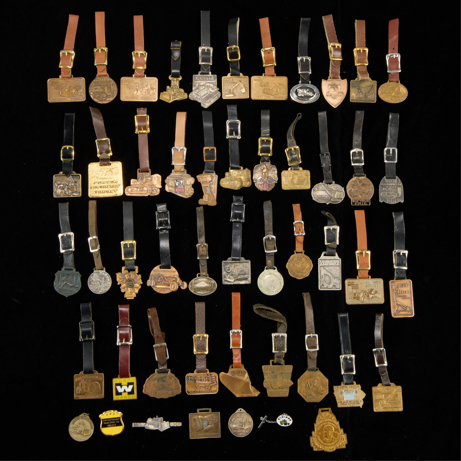 Group Assorted Vintage Watch Fobs: Large group of assorted vintage watch fobs. (Shipping) height: 6 in x width: 6 in x depth: 6 in.