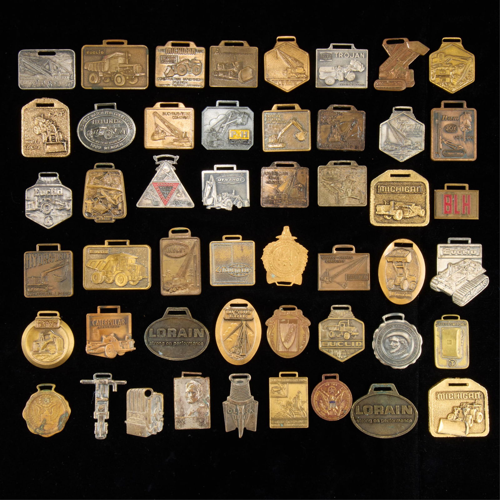 Group Assorted Vintage Watch Fobs: Large group of assorted vintage watch fobs. (Shipping) height: 6 in x width: 6 in x depth: 6 in.