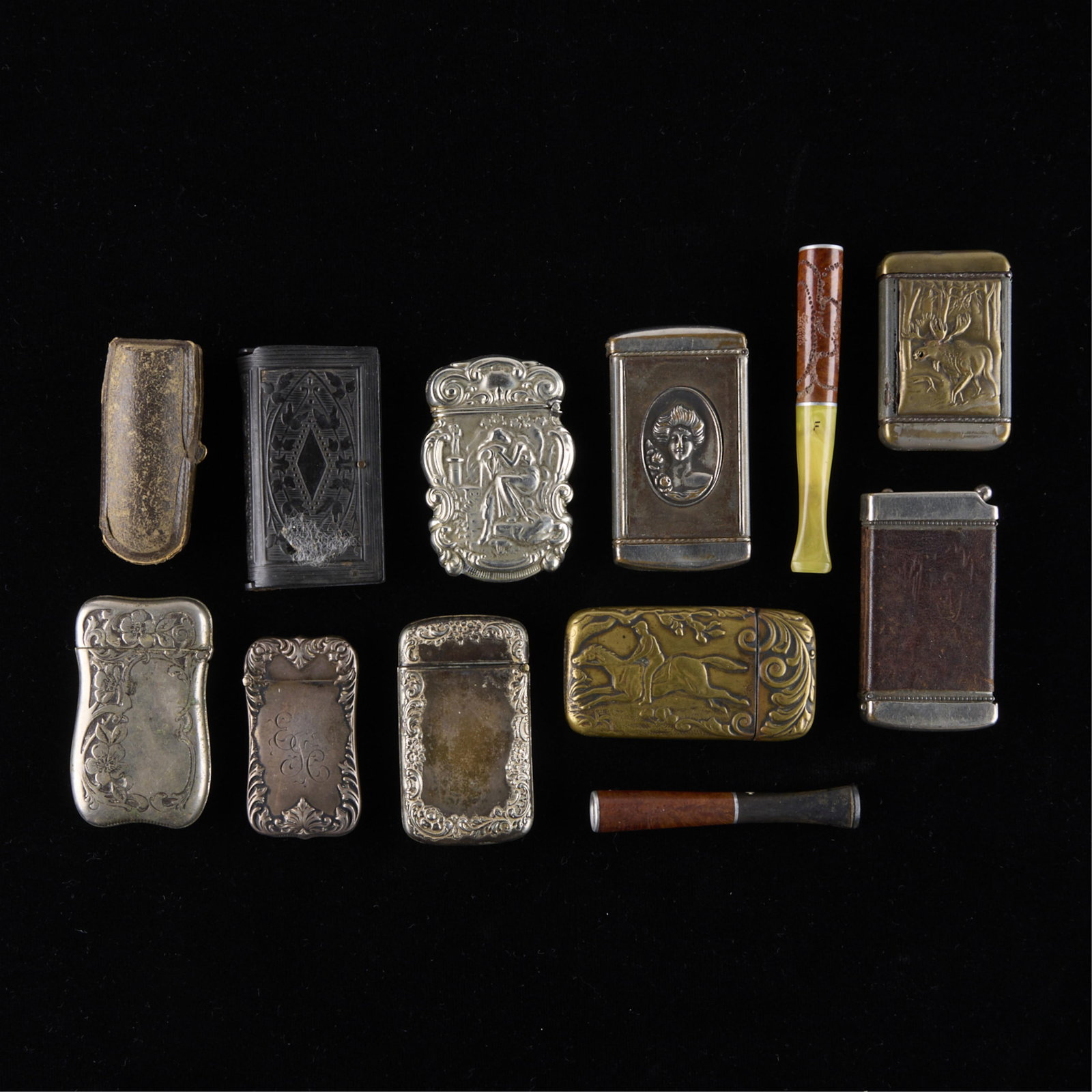 11 Vintage Matchboxes & 2 Pipestems: Group of 11 vintage matchboxes and two pipestems. (Shipping dimensions) Height: 5 in x width: 6 in x depth: 2 in.