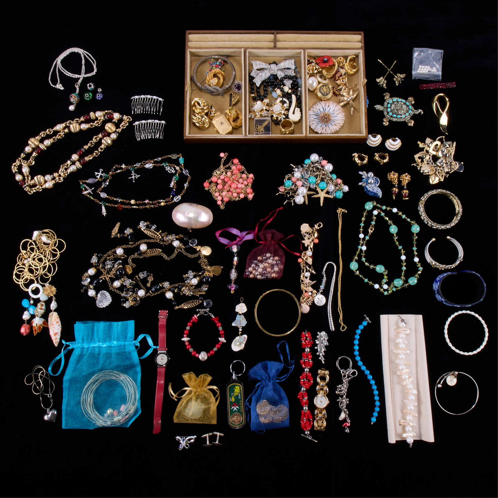 Large Assorted Collection Costume Jewelry: Large assortment of modern and vintage costume jewelry. Including brooches, earrings, necklaces, bracelets, women's watches, trinket boxes, and more.(Shipping dimensions) Height: 8 3/4 in x width: 16