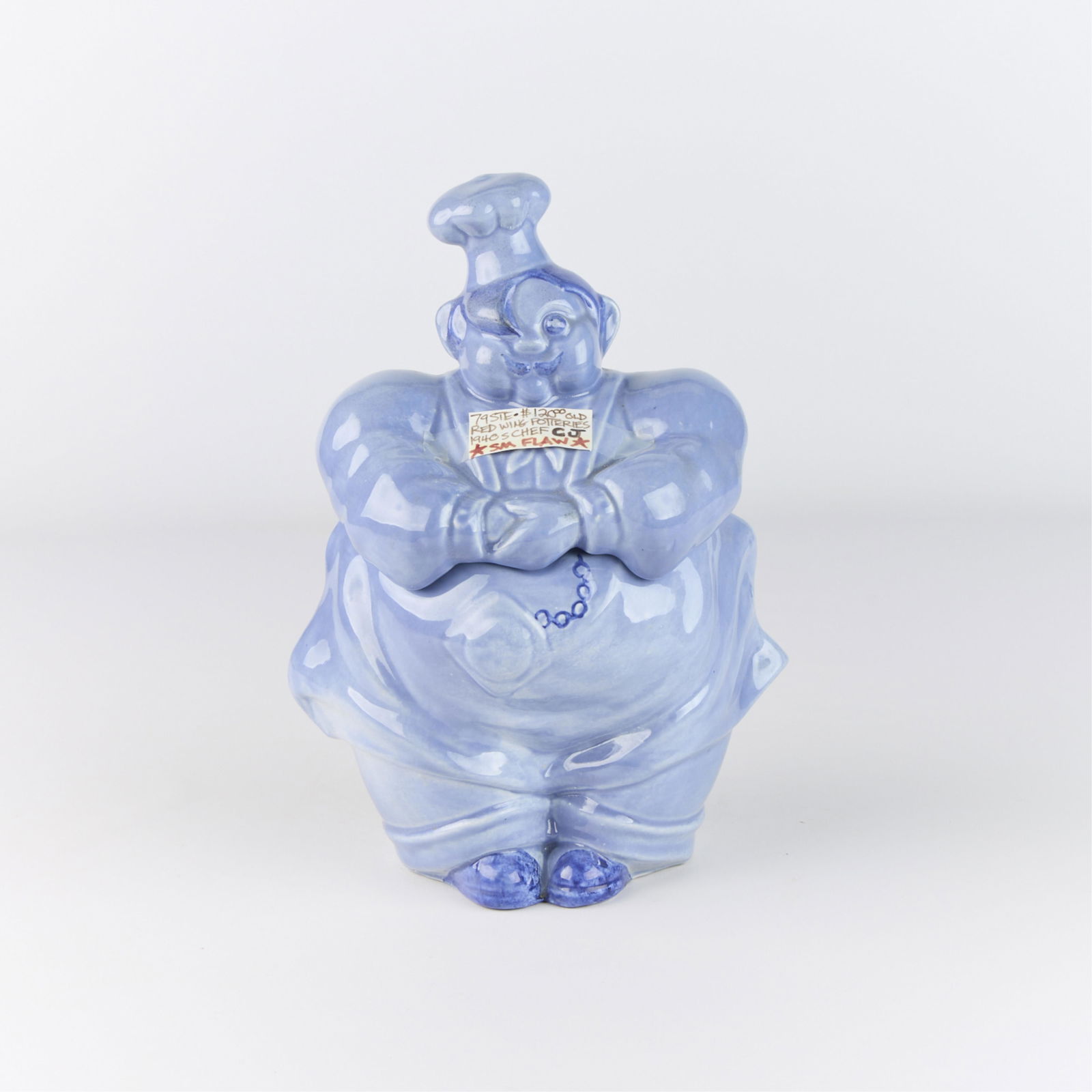 Vtg Red Wing Pottery "Pierre the Chef" Cookie Jar: Red Wing Pottery, Minnesota. Ceramic "Pierre the Chef" cookie jar, ca. 1940s. Executed in a pale blue or indigo glaze.Height: 12 1/2 in x diameter: 9 in.