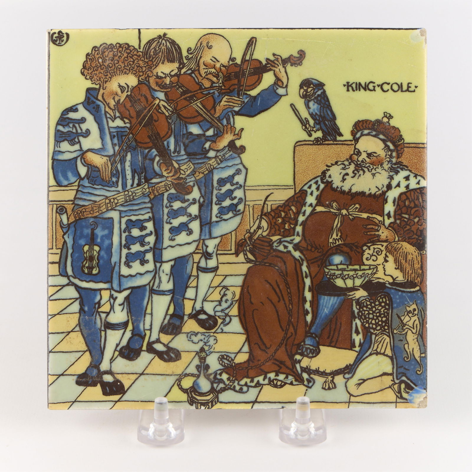 Mosaic Tile Co. "Old King Cole" Pictorial Tile: Mosaic Tile Company, United States. Stylized "Old King Cole" pictorial tile depicting Walter Crane's Victorian-era illustration of the titular monarch. Marked along the underside. Height: 6 in x