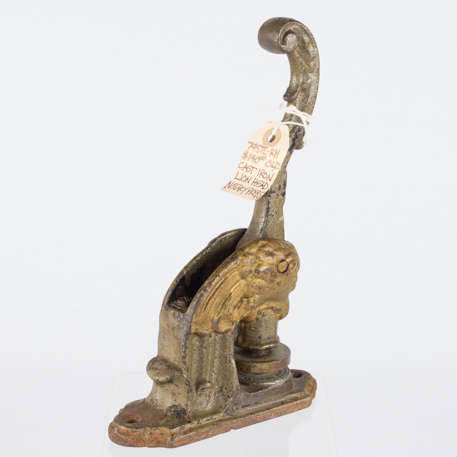 Antique 19th c. Cast Iron Lion Notary Seal Press: Antique painted cast iron notary seal embosser or press in the form of a lion's head, 19th century.Height: 10 in x width: 6 1/2 in x depth: 2 1/2 in.
