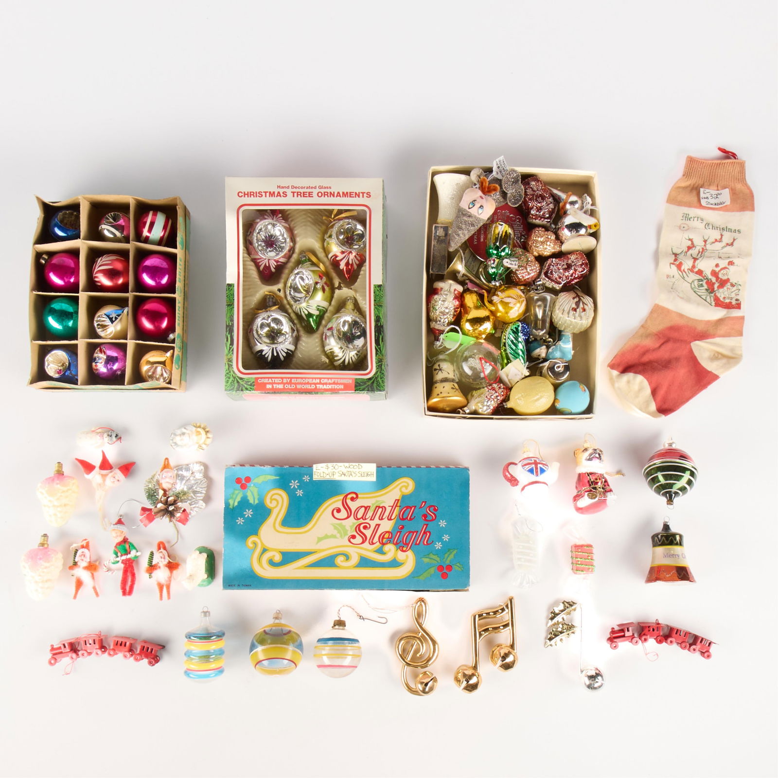 Large Collection Assorted Christmas Ornaments: Large collection of assorted Christmas ornaments and decorations.(Shipping dimensions, approx.) Height: 10 in x width: 16 in x depth: 12 1/2 in.