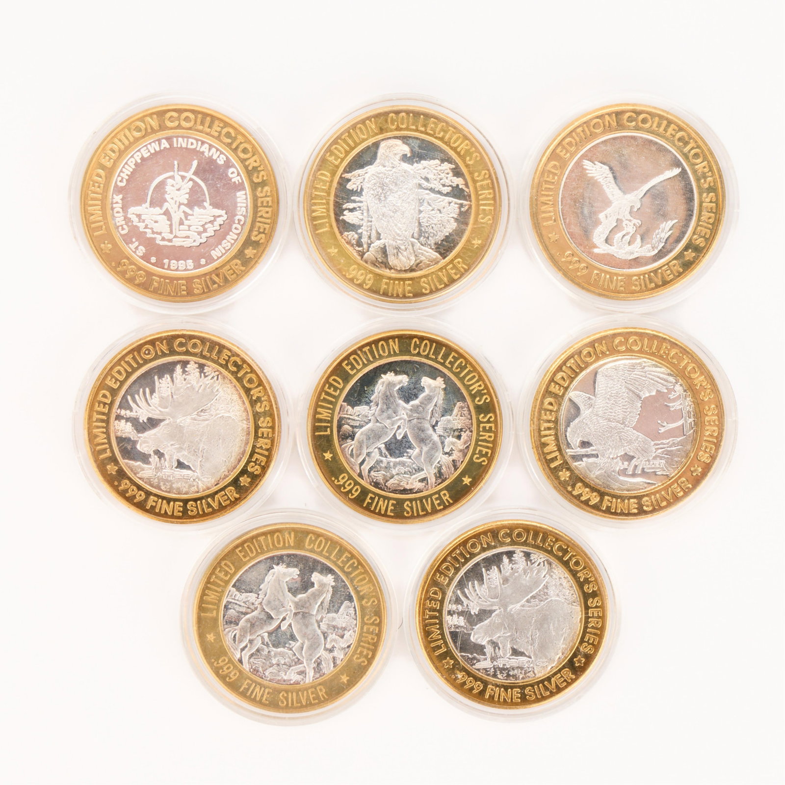 8 Grand Casino Silver Commemorative Collector Coins - 296.7 g: Group set of eight commemorative Grand Casino tokens or medallions. Each marked ".999 Fine Silver." (Each) Diameter: 1 3/4 in. Gross weight: 296.7 g.