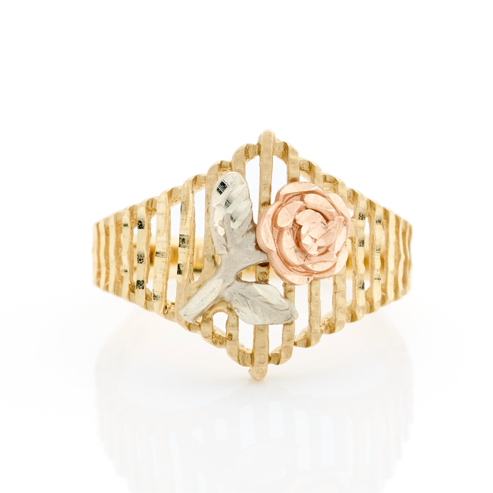 Michael Anthony 10k Gold Tri-Color Floral Ring: Michael Anthony 10k gold tri-color ring depicting a central rose. Marked 10k along the interior. Ring size: 7 US. Weight: 2.79 g.
