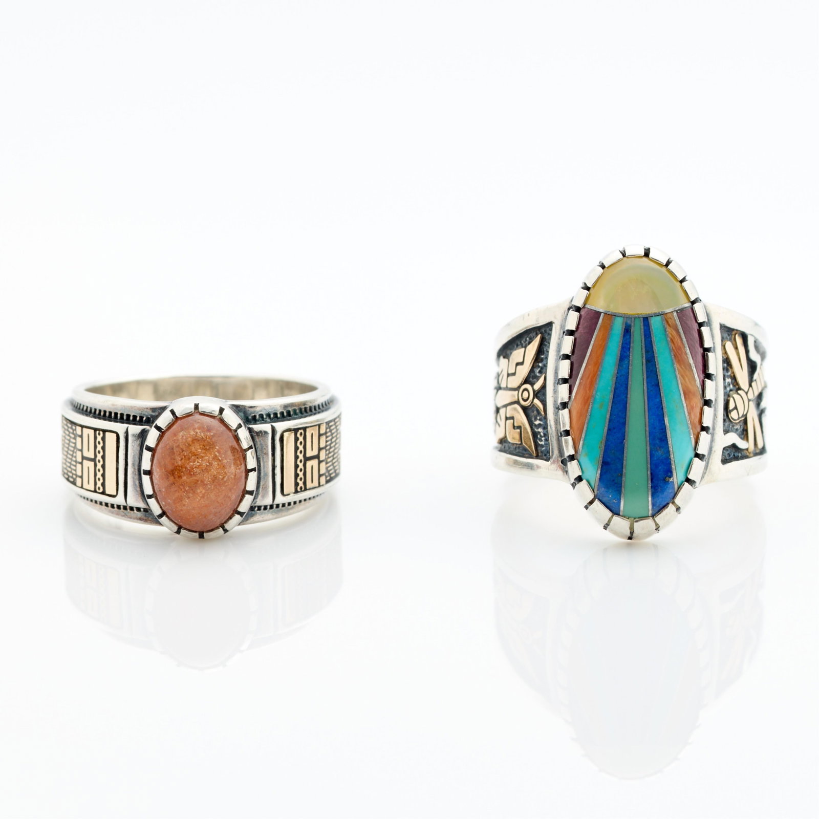 2 Roderick Tenorio 14k Gold & 925 Sterling Rings: Group of two Roderick Tenorio 14k gold and 925 sterling silver rings. Each with inlaid stones and southwestern motifs. Each marked 14k and 925 along the interior. (Each) Size: 7 1/2 US. Gross weight: 