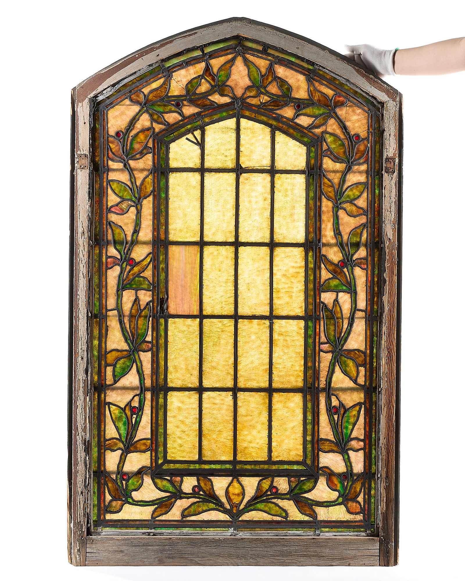 Arts & Crafts Leaded Stained Slag Glass Window: Arts & Crafts or Art Nouveau slag stained glass window featuring floral motifs. Height: 53 in x width: 32 in x depth: 3 1/2 in.