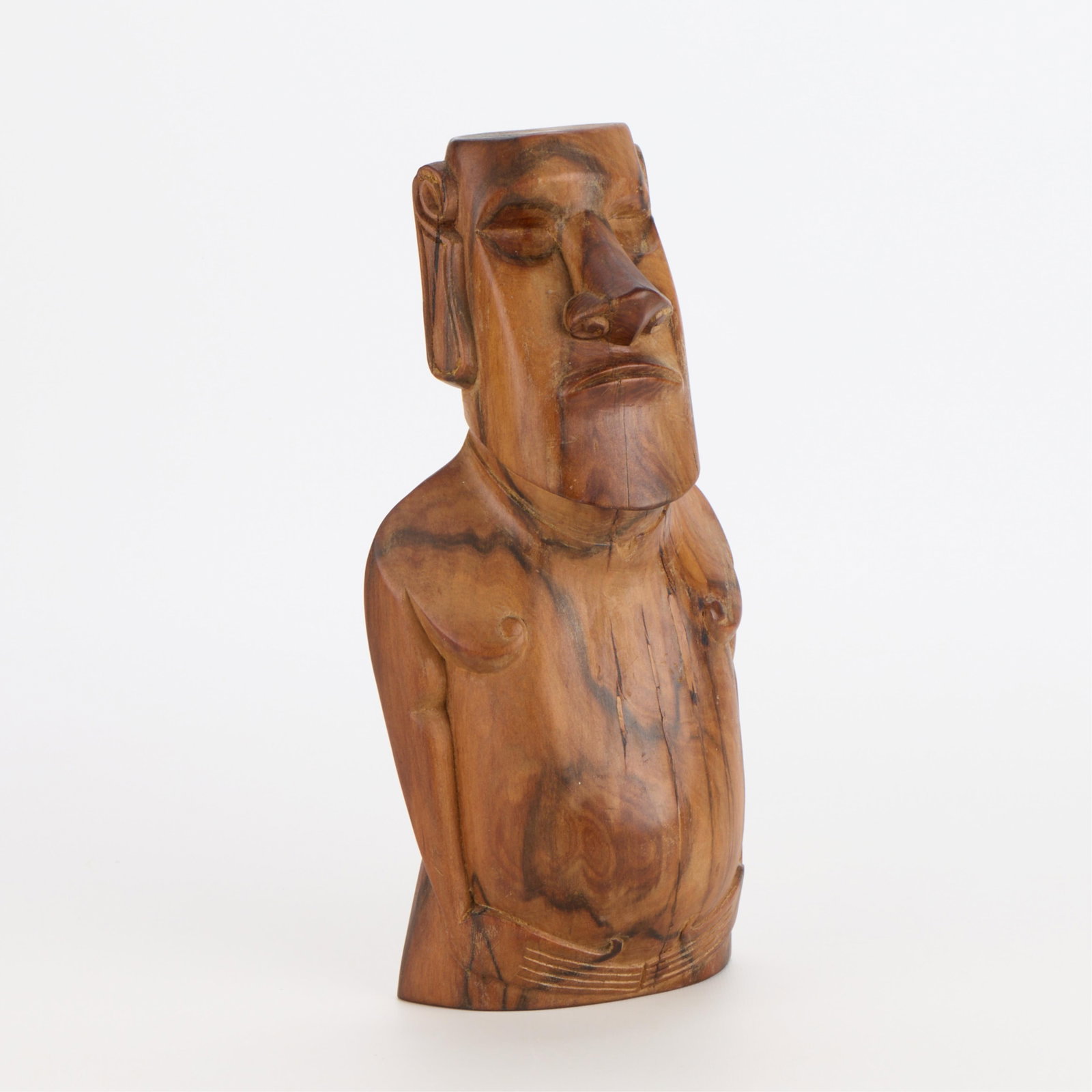 Easter Island Rapa Nui Carved Wood Moai Sculpture: Rapa Nui (Easter Island) carved wooden moai head or sculptural figure. Height: 11 1/4 in x width: 5 in x depth: 3 in.