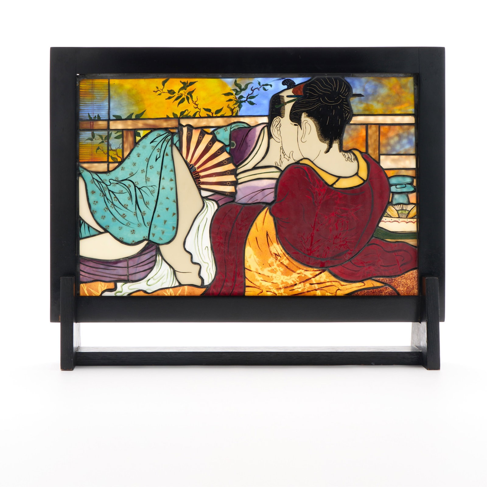Japanese Woodblock Style Stained Glass: Table screen stained glass display depicting an amorous couple in the style of Japanese woodblock prints. Height: 18 in x width: 22 1/2 in x depth: 4 in.