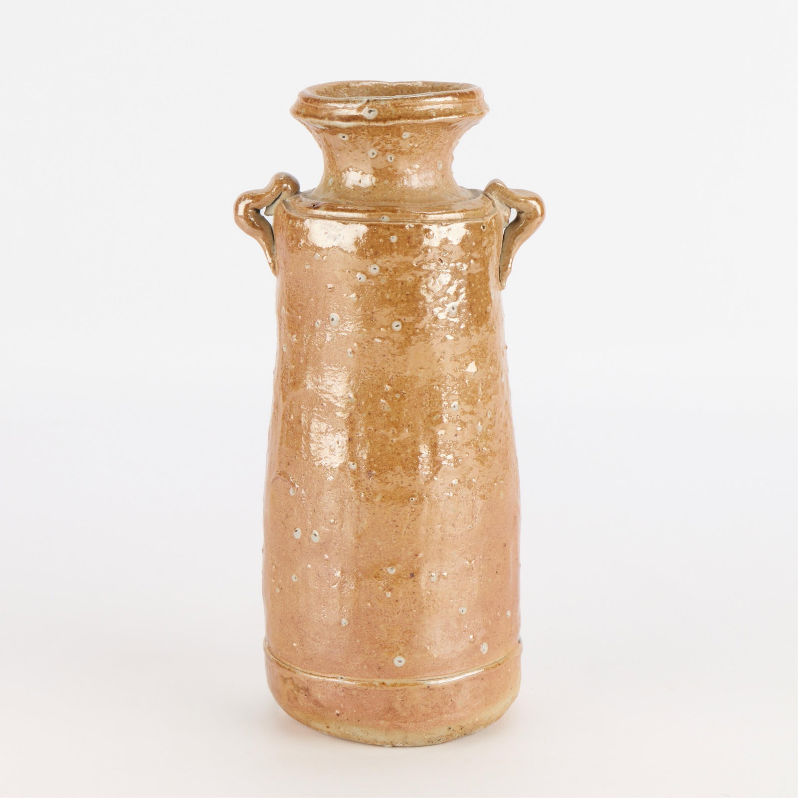 Japanese Iga Ware Pottery Vase w/ Handles: Japanese Iga ware ceramic pottery flower or ikebana vase with two lug handles along either side of the shoulder. With incised mark along the underisde. Height: 10 3/4 in x width: 5 1/2 in x diameter: 