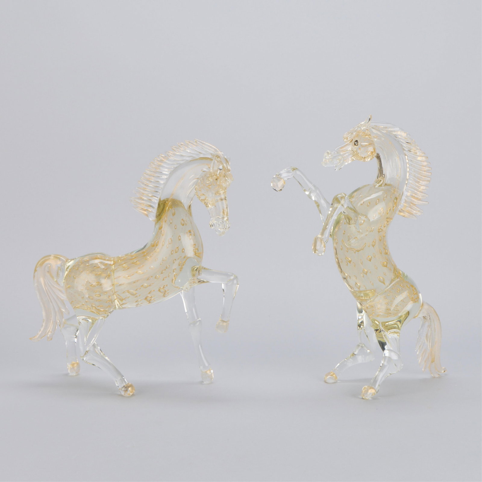 Pr "Rearing Horses" Italian Palesa Murano Glass Figurines: Pair of Italian Palesa Murano art glass sculptures in the form of dynamic, rearing horses. Each etched "Palesa Murano" along the underside. Height ranges from 11 1/2 in to 12 1/2 in; width ranges from