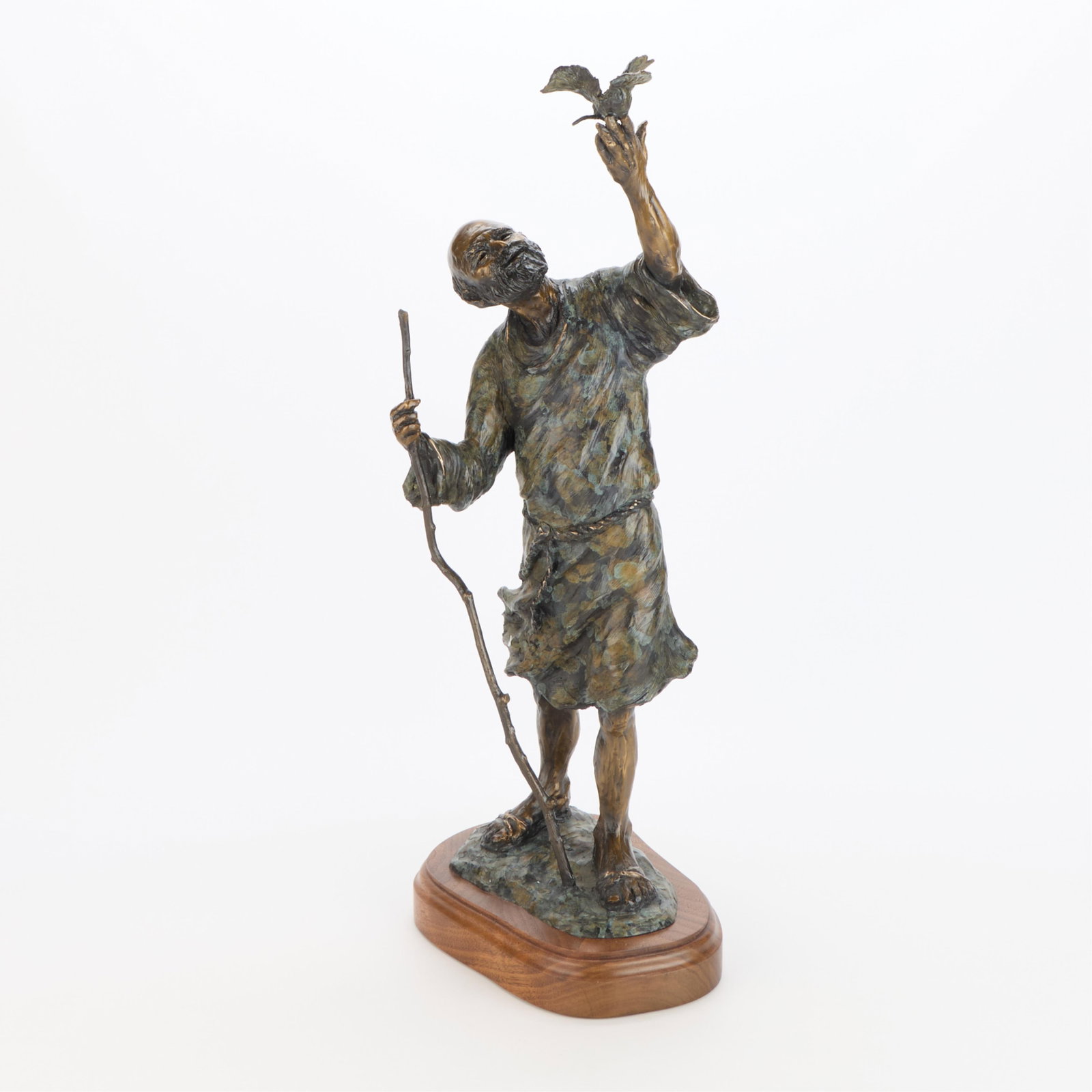Rosalind Cook "Noah" Bronze Sculpture 2007: Rosalind Cook (American, 20th/21st century). Bronze sculpture depicting the biblical figure Noah with a staff in his right hand and small bird perched atop his left hand, 2007. Incised signature, date