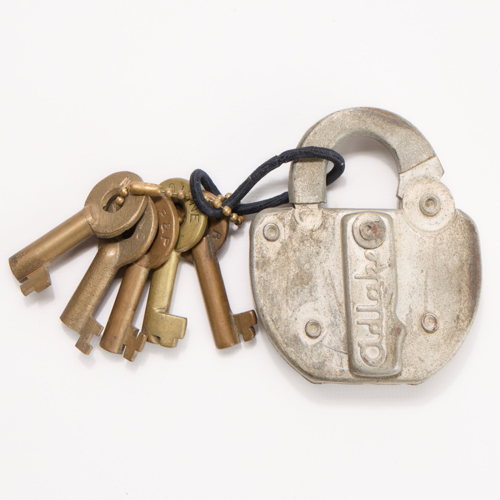 Railroad Keys & Lock: Antique Adlake railroad lock with five keys. Keys stamped: SooLine, CM St P&P, BN Inc, NP, and CM St P&P R. (Lock) height: 3 1/2 in x width: 3 1/4 in x depth: 1 in.