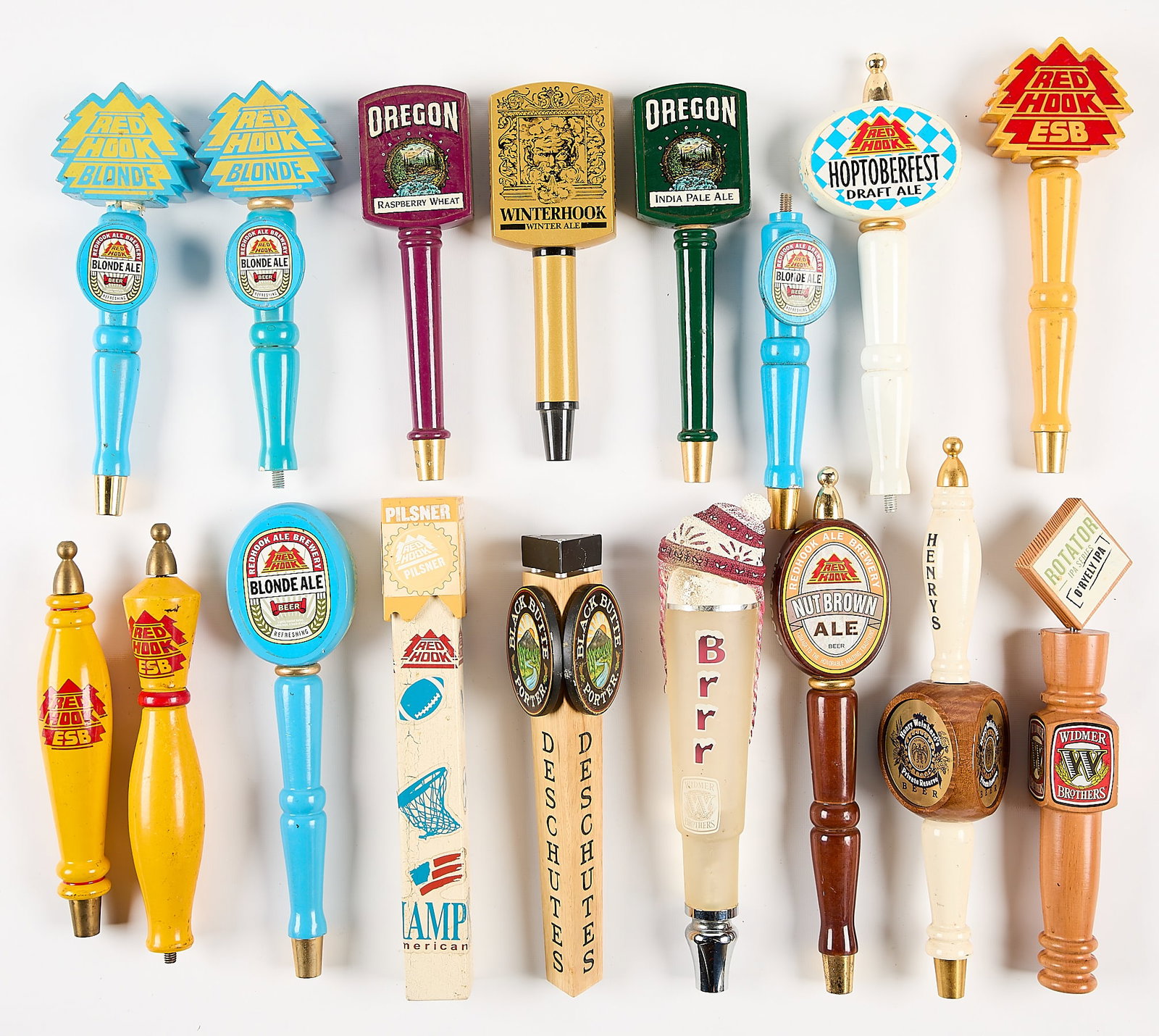 17 Oregon Based Beer Taps: Group of 17 Oregon based brewing company beer taps. Including: Widmer Brothers, Henry Weinhard's, Oregon Original, Red Hook, and Black Butte. (Shipping dimensions) Height: 7 in x width: 14 in x