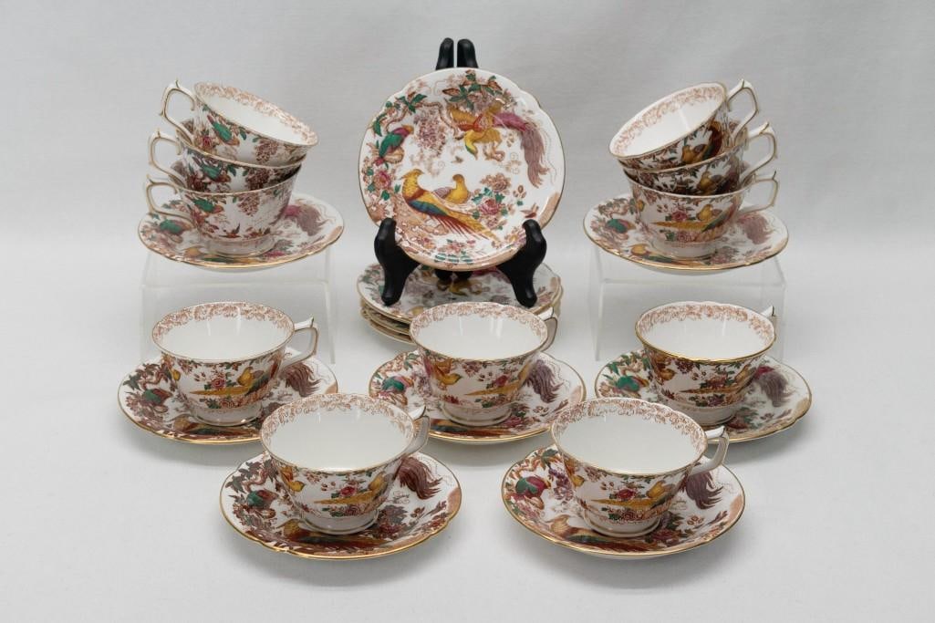Olde Avesbury Royal Crown Derby 11 Footed Cups/Saucers: Eleven (11) sets of footed cups and saucers in the Olde Avesbury pattern by Royal Crown Derby. The saucers measure 5 3/4 inches across, the footed cups are 2 3/8 incheses tall and saucers are 3 5/8 in