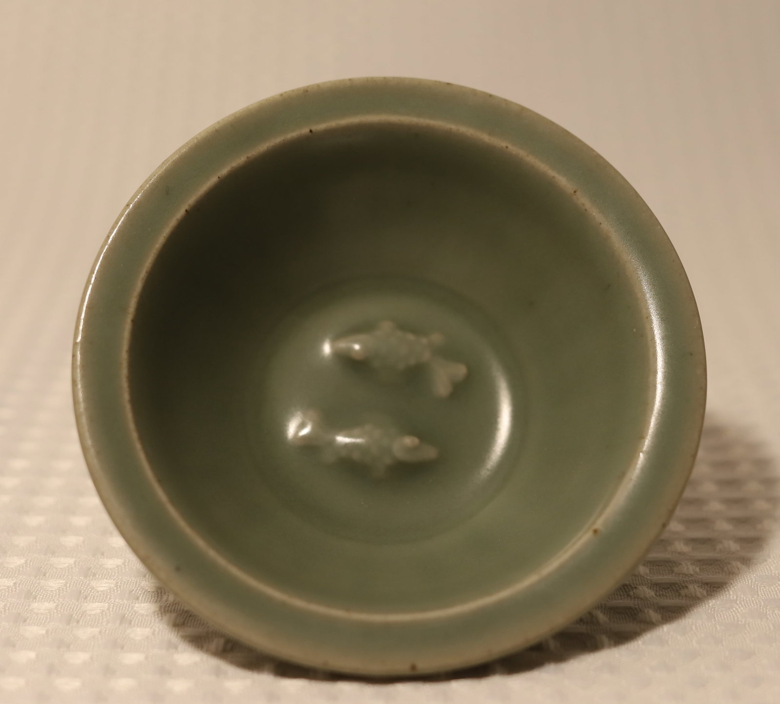 A  small "twin fish" dish made of Longquan Seladon (1 of 2)
