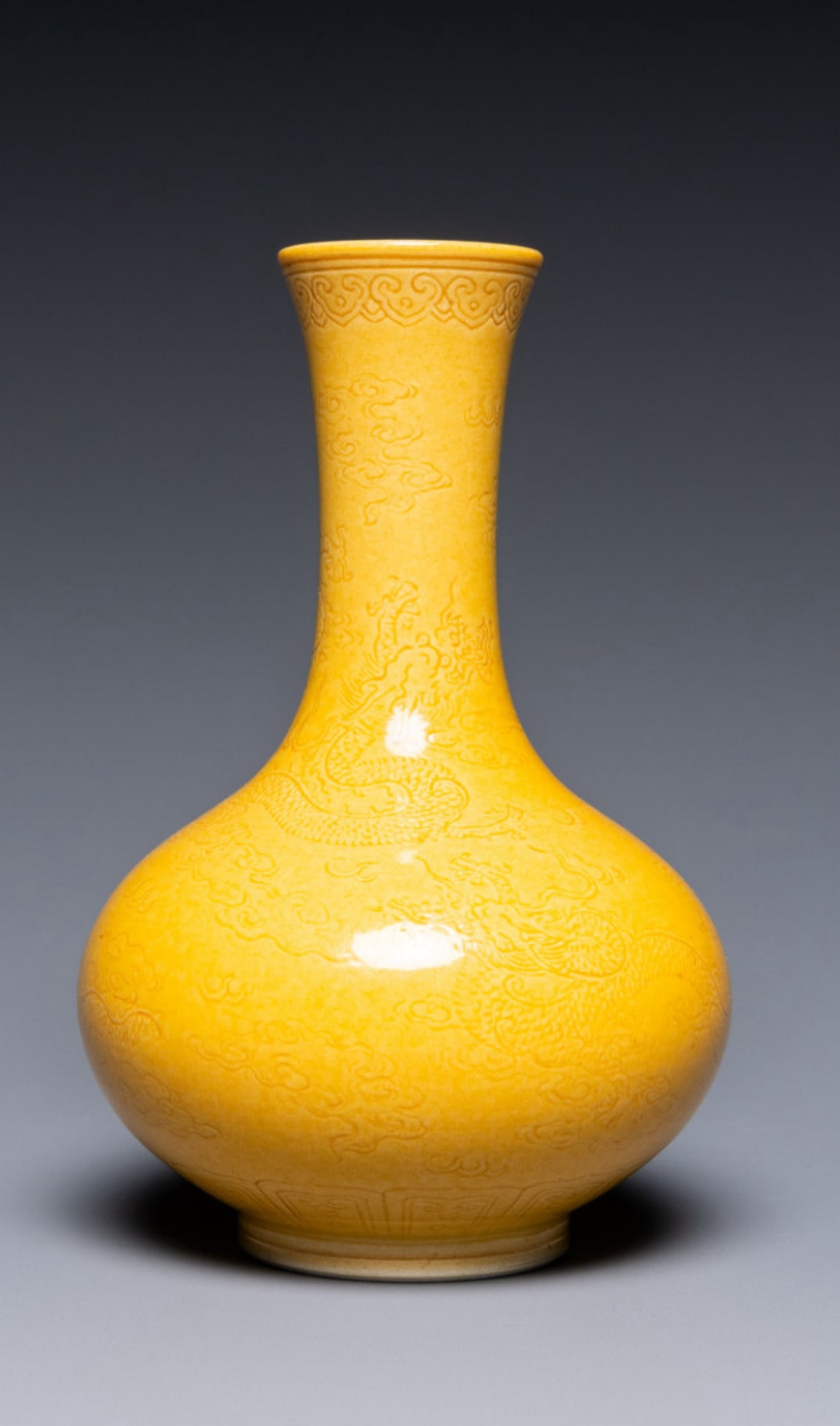 A  Chinese yellow-glazed 'dragon' bottle vase (1 of 5)