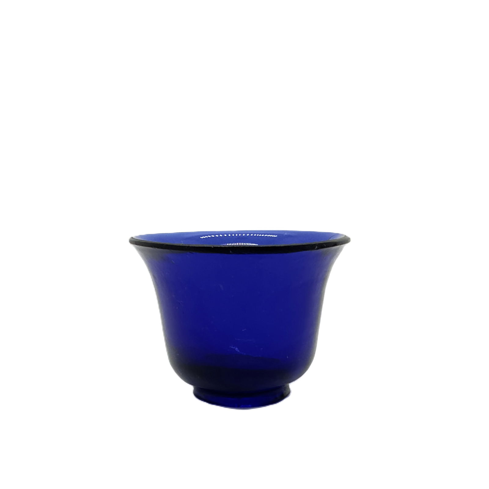 A Chinese blue glass bowl of the Guangxu period in the Qing Dynasty (with the Guangxu reign mark).: This elegant bowl represents the pinnacle of imperial glassmaking in 19th-century China, crafted at the Imperial Glass Workshop (established 1696 within the Forbidden City). Fashioned from rich, trans