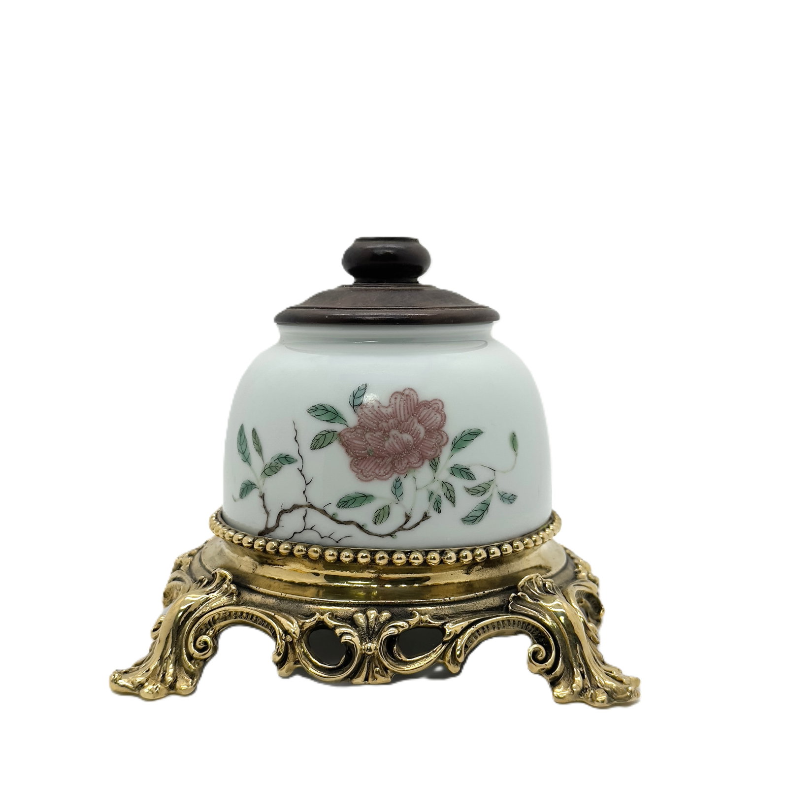 Famille Rose Floral Bell Form Incense Burner: A charming antique Chinese bell-shaped incense burner or censer, featuring delicate famille rose floral decoration and set on an ornate gilt brass stand with a wooden finial. Height: 5.5''(14cm)