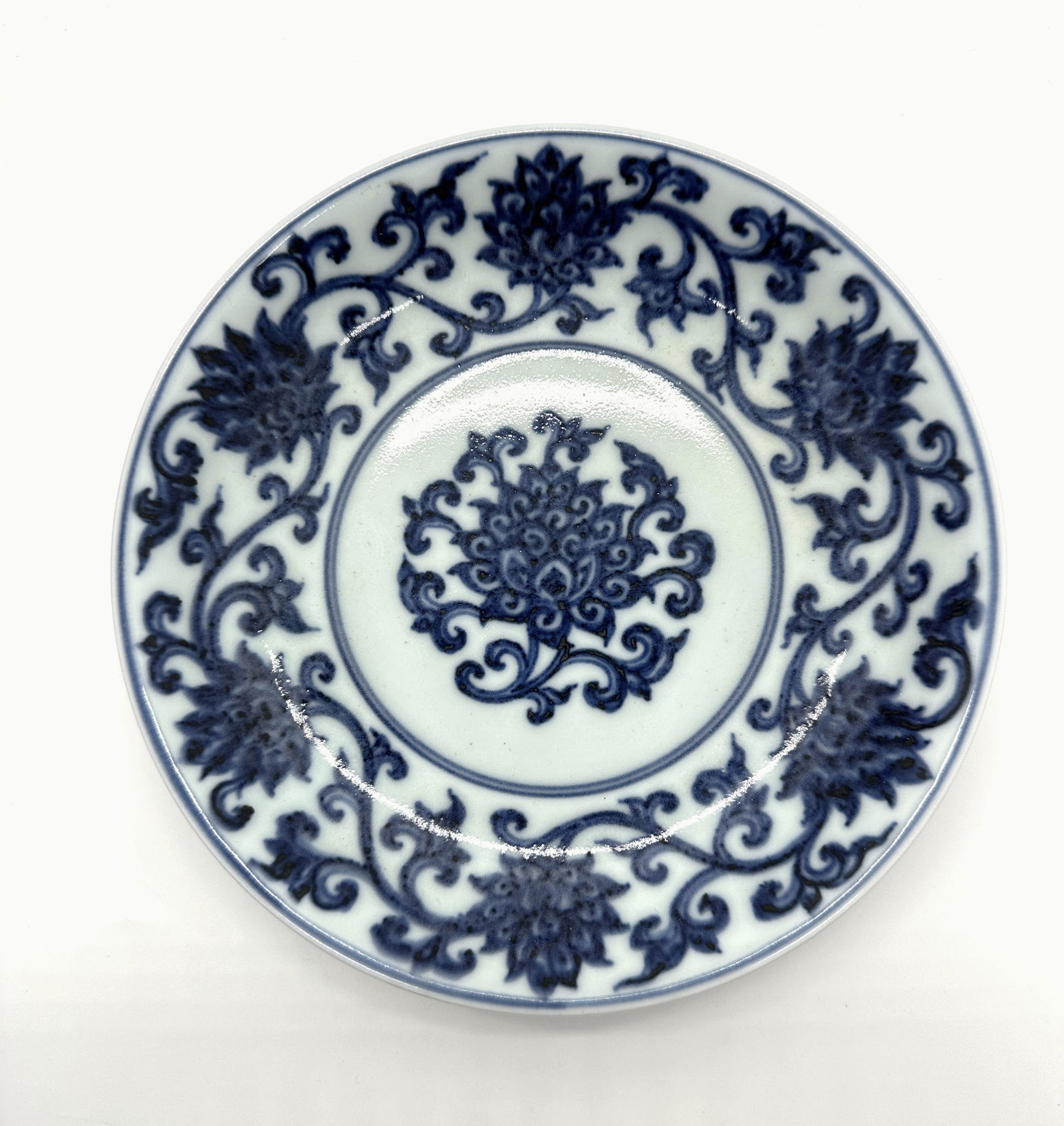 A Chinese famille rose 'dragon' bottle vase: A bottle vase decorated with Buddhist emblems and golden dragons chasing the flaming pearl among clouds. Six character red Guangxu mark at the base. China, 20th century. Height:39.5cm