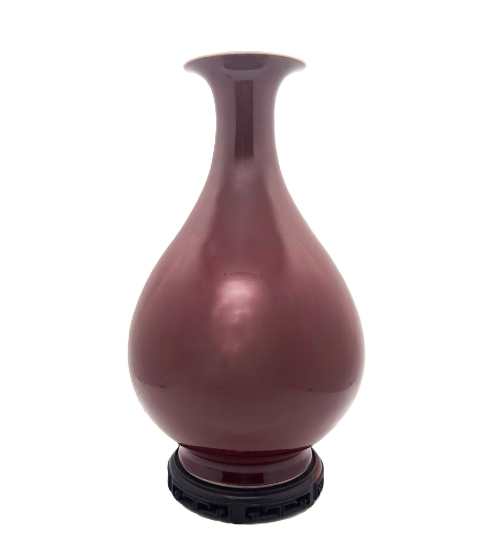 A Chinese Copper-Red Glazed Vase, 20thC: A Chinese Copper-Red Glazed Vase, elegant [yuhuchunping] form vase on a slightly splayed foot with six character seal mark for QianLong at base in underglaze blue, 12 1/4 in(31.5cm).