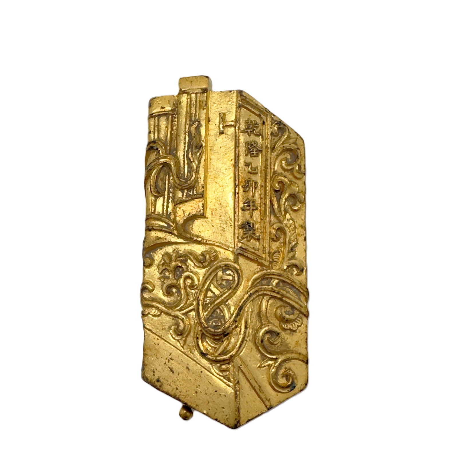 Chinese Gilt-Bronze 'Scroll' Incense Box with Hidden Compartment, Mark and Dated Qianlong Yimao: This exceptional incense box is masterfully crafted in the form of a bound scroll, cast from bronze and entirely covered in a rich, lustrous gilt finish. The exterior is intricately carved in high rel