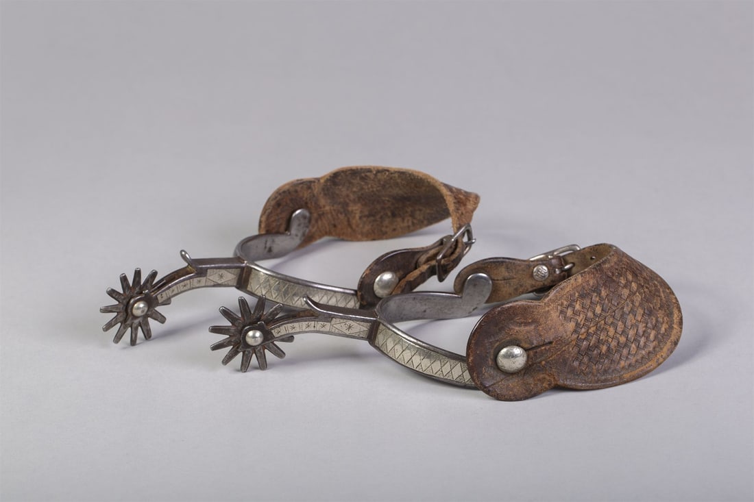Canon City Prison made Double Mounted Spurs: Fine pair of Canon City prison made, double mounted, White & Davis pattern spurs with tooled leather spur straps, full inlay diamond design heel band including star design shank. Old tag attributes th