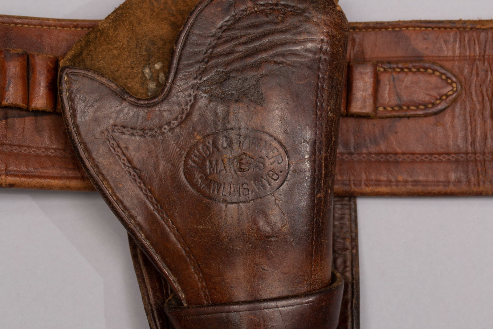 Wyoming marked Holster & Belt - Knox & Tanner, Ca. 1900-1905: Brown leather marked western rig for a Colt SAA 4 3/4", .44/45 in great condition. Knox & Tanner Saddlery in Rawlins, Wyoming was in business from 1900 to 1905. They were very well known for their qua