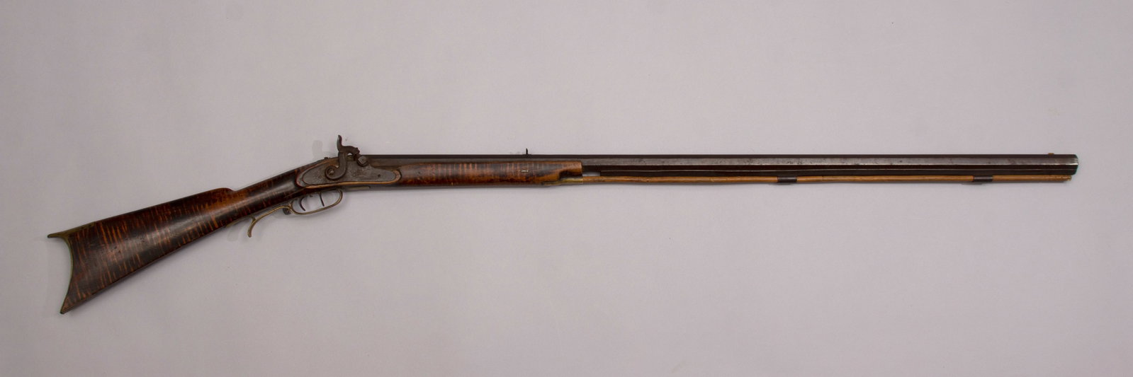 Henry E. Leman, Pennsylvania Percussion 1/2 Stock, .36 Caliber Rifle, Fenn Family Collection: Antique H.E. Leman percussion, .36 caliber, half forearm stock with a double set trigger overall length 53". Octagon barrel with markings on top "HE LEMAN LANDCASTER PA WARRANTED": length 37". Marked 