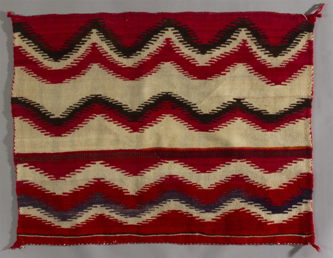 Navajo Child's Blanket, Ca. 1890s: Navajo Child's Blanket with four full length deep serrated wave meanders. Hand woven from all handspun and hand dyed, silky, long staple Native Churro cross sheep wool, Ca. 1890s. Measurements: 31" x 